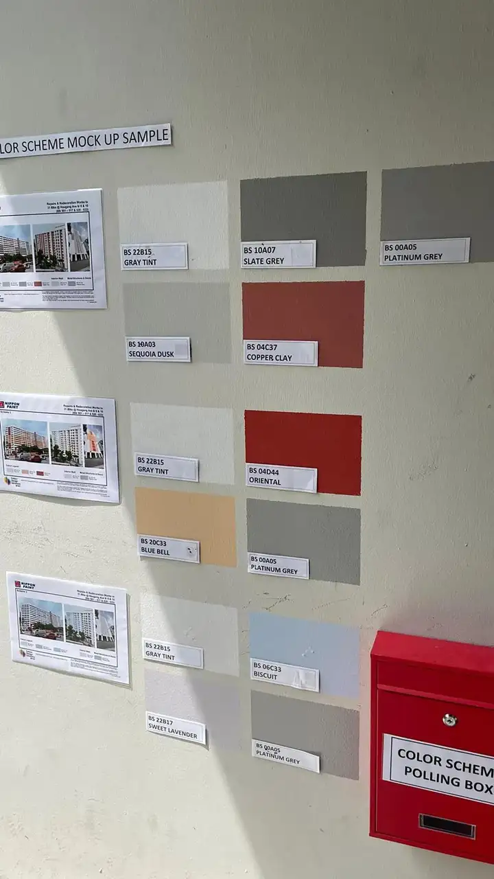 A colour scheme polling station in Singapore for residents of a HDB housing block to select the new paint scheme.